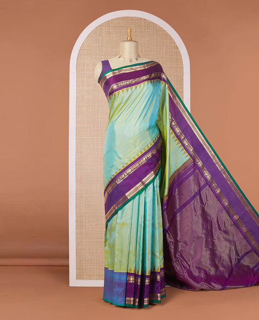 Green plain design gadwal silk saree, contrast rettai pettu traditional zari border & pallu of zari stripes