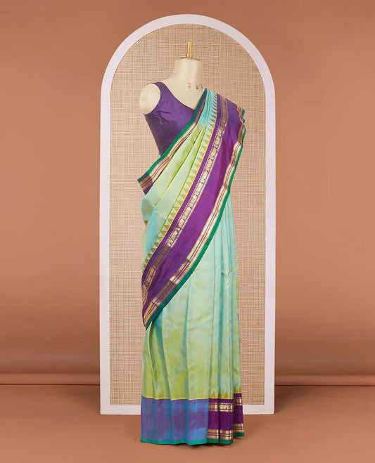 Green plain design gadwal silk saree, contrast rettai pettu traditional zari border & pallu of zari stripes