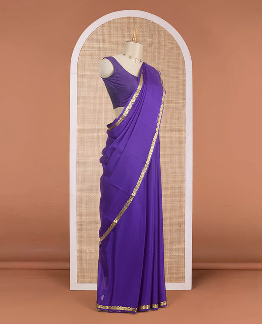 Violet plain Mysore silk saree, golden zari paisley design border & thick-zari striped pallu