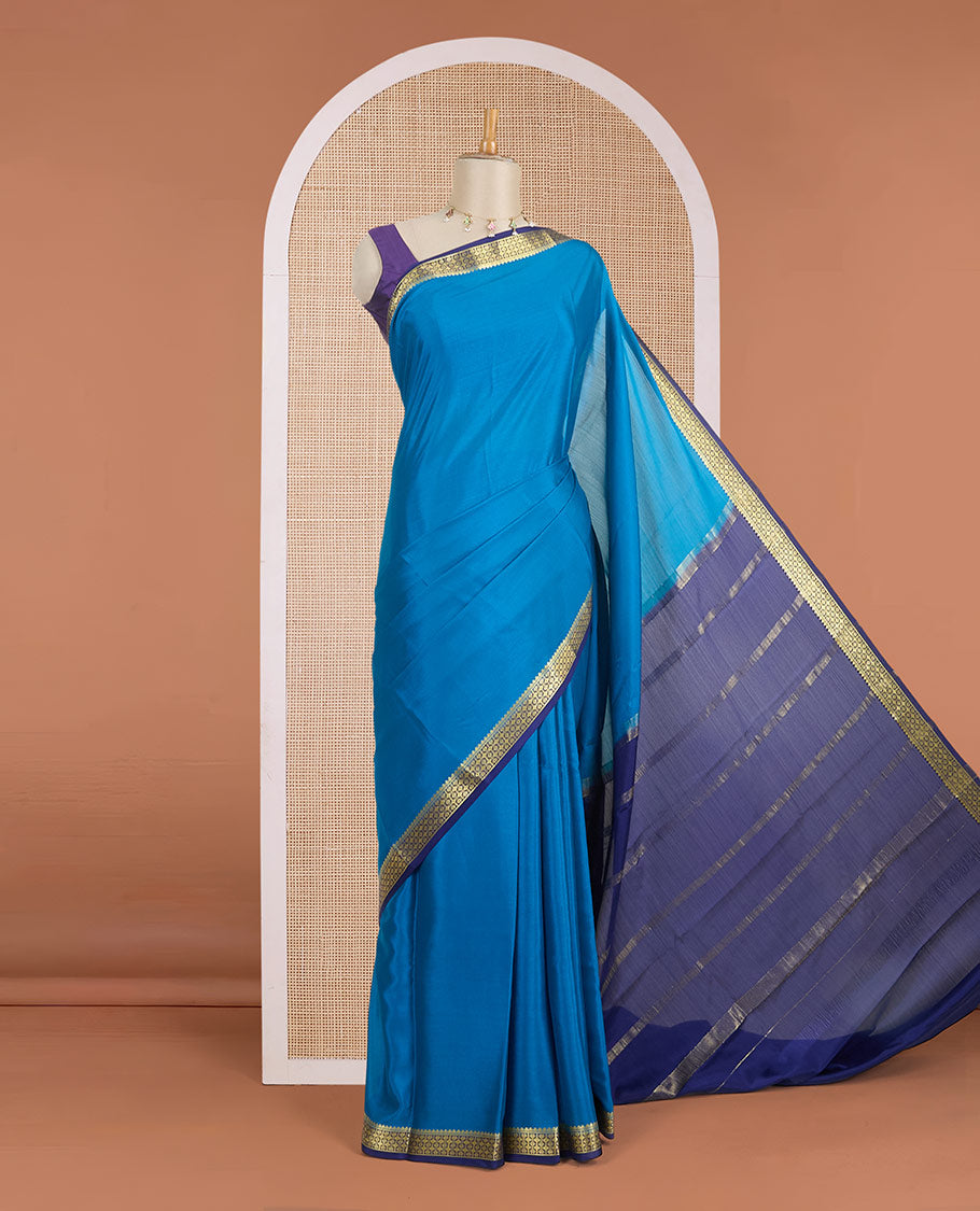 Blue plain Mysore silk saree, contrast golden zari border woven in traditional motifs & zari striped pallu