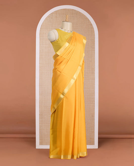 Orange full-plain Mysore silk saree, traditional zari design border & pallu of zari stripes