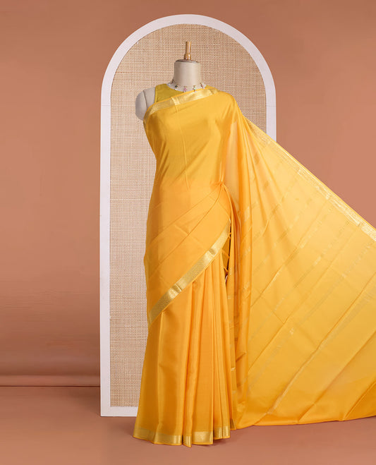 Orange full-plain Mysore silk saree, traditional zari design border & pallu of zari stripes