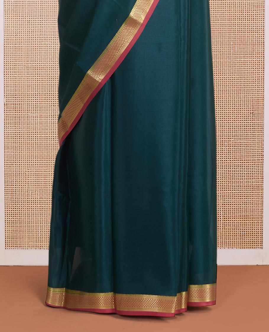 Deep forest green full-plain Mysore silk saree, contrast traditional zari design border & pallu of zari stripes