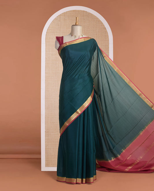 Deep forest green full-plain Mysore silk saree, contrast traditional zari design border & pallu of zari stripes