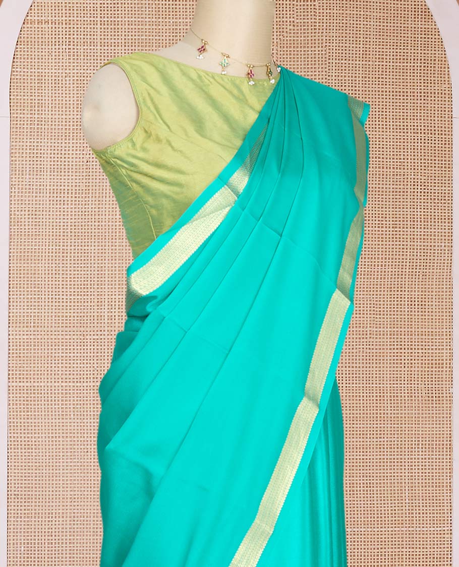 Green plain Mysore silk saree, traditional zari design border & pallu of thick zari stripes