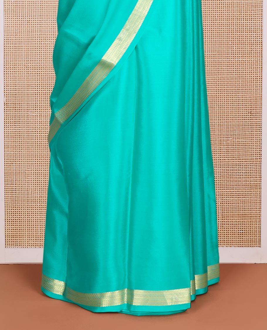 Green plain Mysore silk saree, traditional zari design border & pallu of thick zari stripes