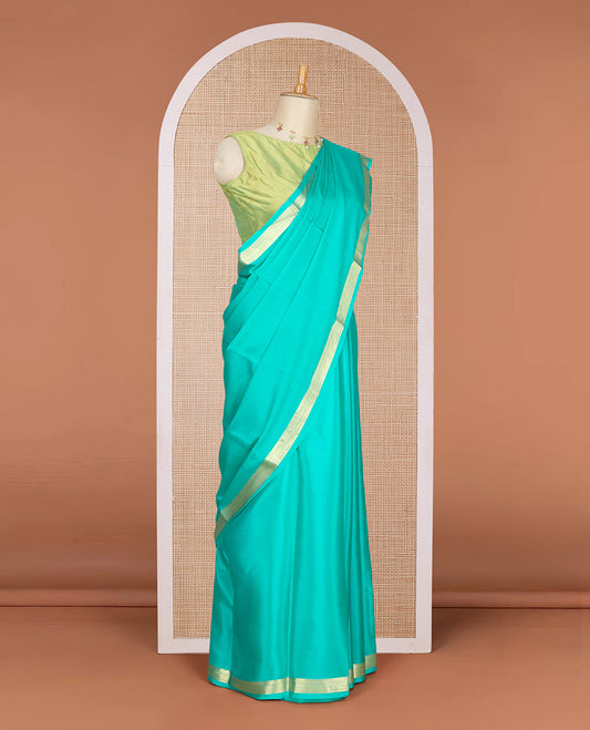 Green plain Mysore silk saree, traditional zari design border & pallu of thick zari stripes