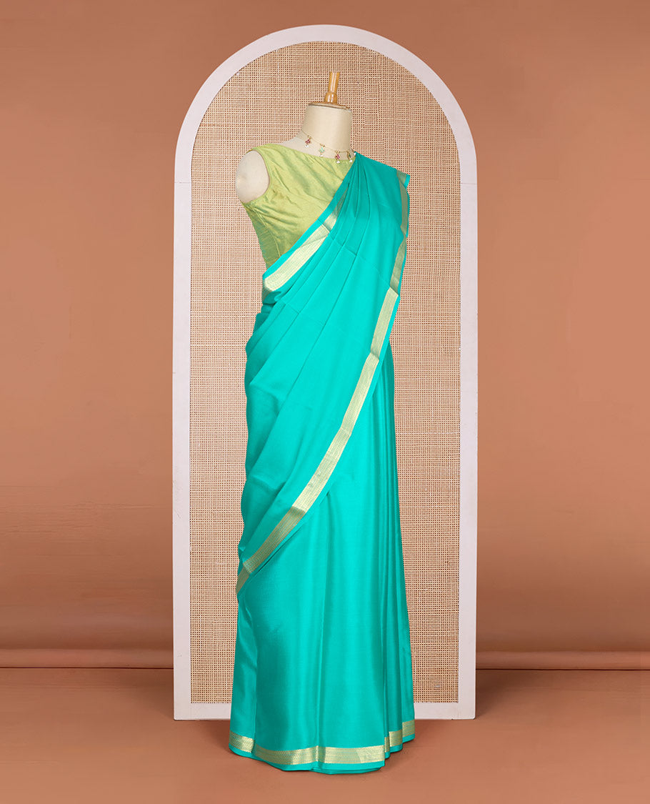 Green plain Mysore silk saree, traditional zari design border & pallu of thick zari stripes