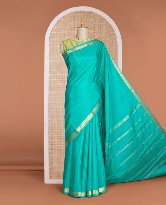 Green plain Mysore silk saree, traditional zari design border & pallu of thick zari stripes