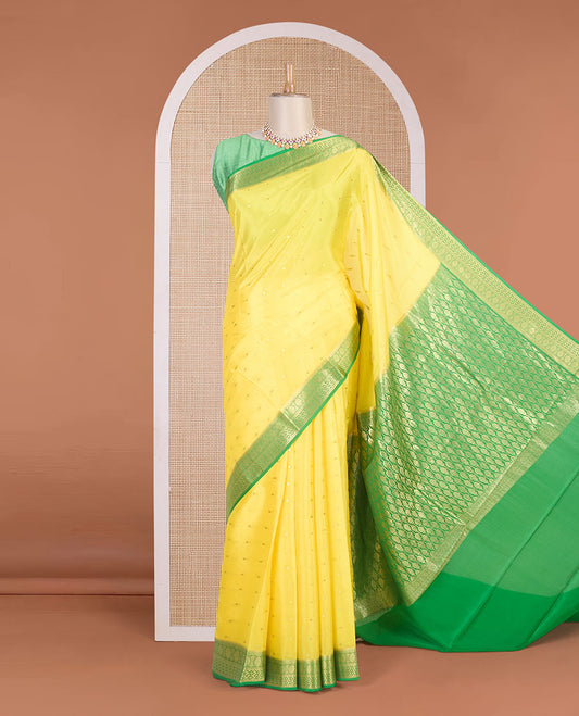Lemon yellow zari buttas Mysore silk saree, contrast traditional zari border & intricately zari woven pallu
