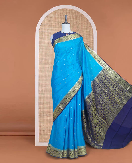 Blue zari buttas Mysore silk saree, contrast traditional zari border adorned with floral creeper design, and floral jaal pallu