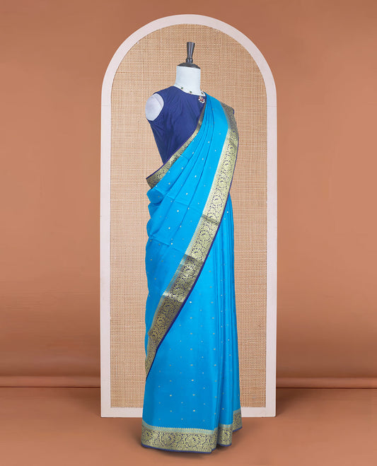 Blue zari buttas Mysore silk saree, contrast traditional zari border adorned with floral creeper design, and floral jaal pallu