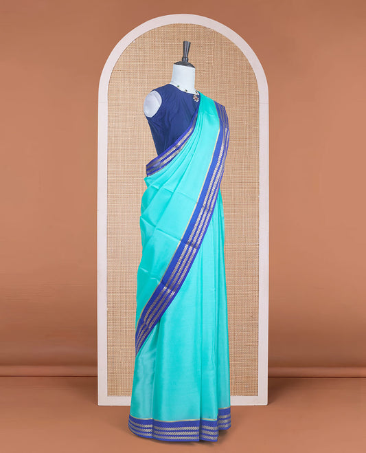 Electric blue plain design Mysore silk saree with contrast rettai pettu borders of zari designs, and zari striped pallu