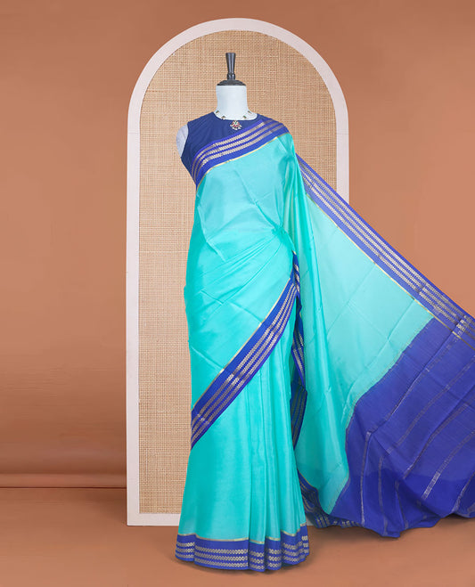 Electric blue plain design Mysore silk saree with contrast rettai pettu borders of zari designs, and zari striped pallu