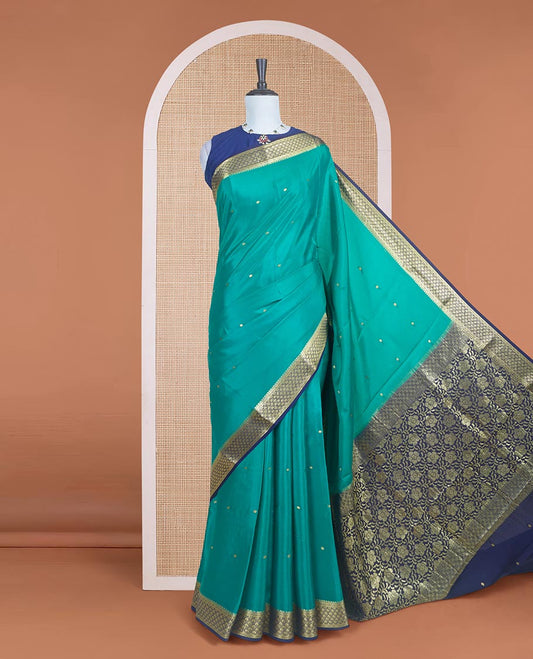 Green zari buttas Mysore silk saree with contrast zari borders of jaal design and pallu of floral jaal design
