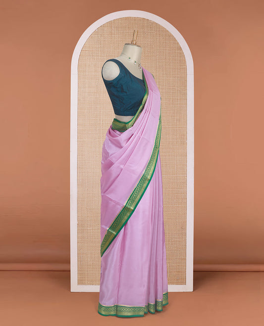 Baby pink plain Mysore silk saree with contrast geometric zari design borders and pallu of zari seer lines