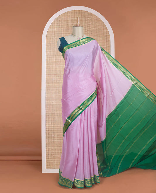 Baby pink plain Mysore silk saree with contrast geometric zari design borders and pallu of zari seer lines