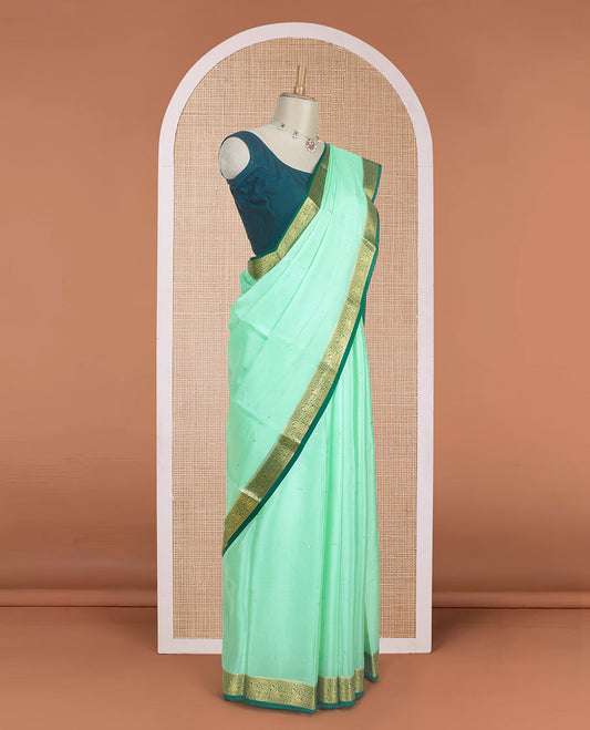 Green zari buttas woven Mysore silk saree, contrast zari paisley motifs woven border, and intricate pallu