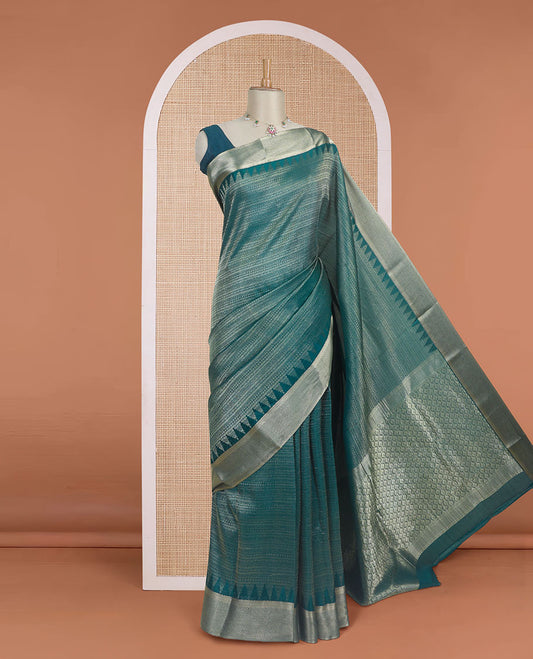 Green zari-woven geometric patterns steeped Mysore silk saree, temple traditional zari border, and jaal pallu
