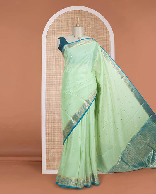 Pista green zari buttas woven Mysore silk saree, contrast jaal design zari border, and pallu adorned with jaal zari design weave