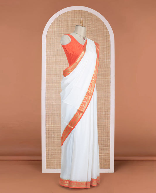 Entralling cream plain Mysore silk saree with contrast geometric zari design borders and pallu of zari seer lines