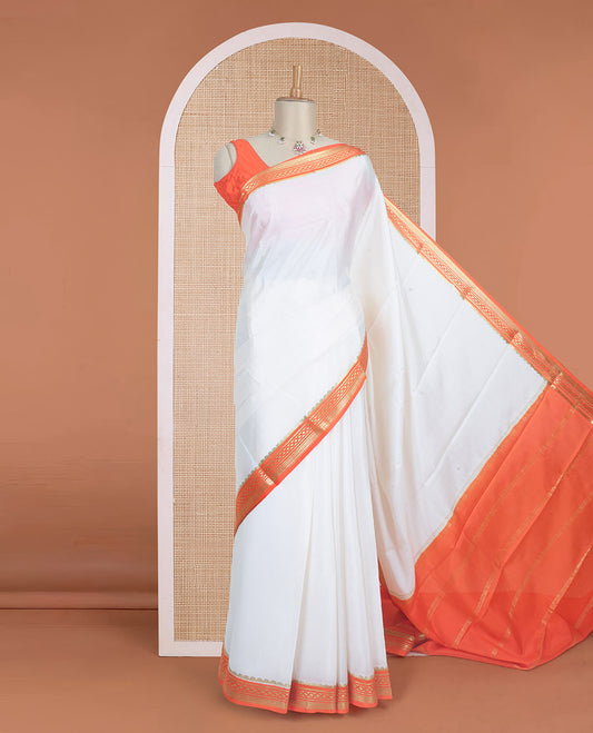 Entralling cream plain Mysore silk saree with contrast geometric zari design borders and pallu of zari seer lines