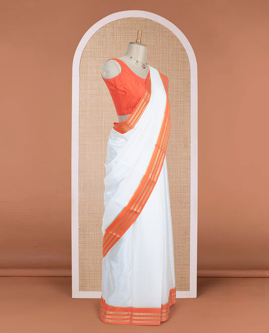 White plain design Mysore silk saree with contrast rettai pettu borders of zari designs, and zari striped pallu