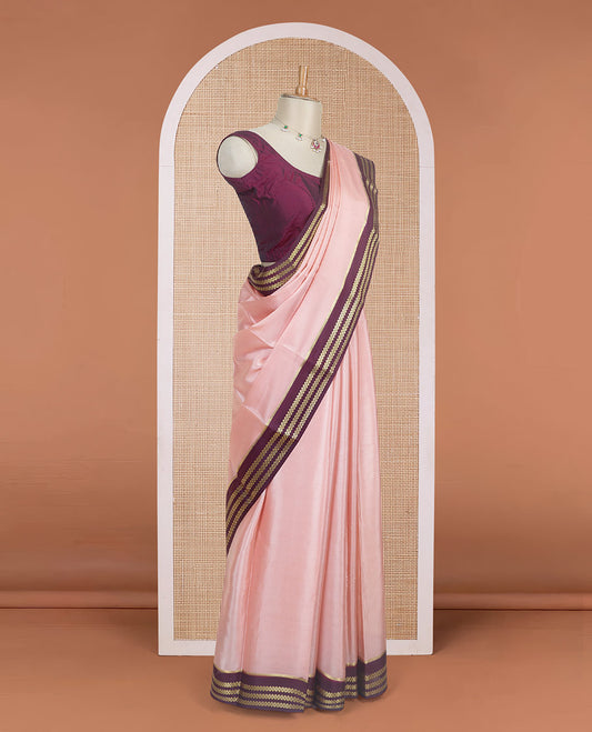 Peach plain design Mysore silk saree with contrast rettai pettu borders of zari designs, and zari striped pallu