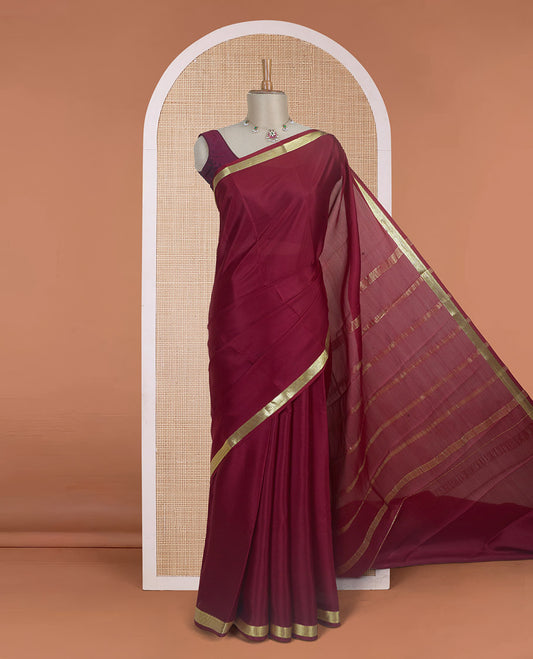 Maroon plain design Mysore silk saree with traditional zari design borders, and zari striped pallu