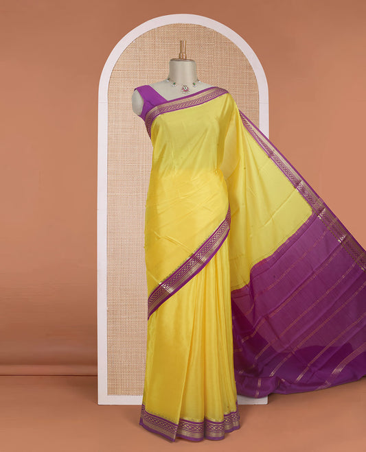 Rasamalai yellow plain Mysore silk saree with contrast geometric zari design borders and pallu of zari seer lines
