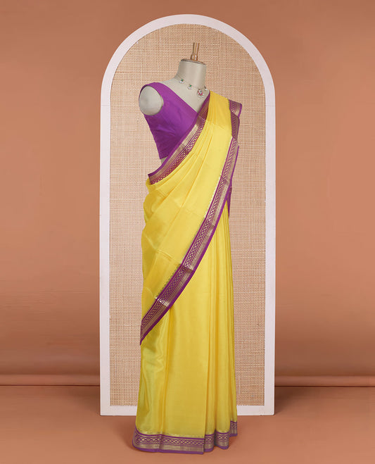 Rasamalai yellow plain Mysore silk saree with contrast geometric zari design borders and pallu of zari seer lines