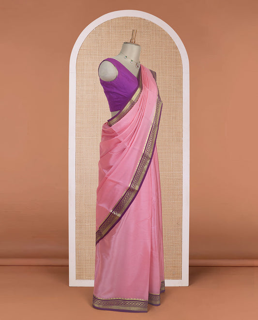 Peach plain Mysore silk saree with contrast geometric zari design borders and pallu of zari seer lines
