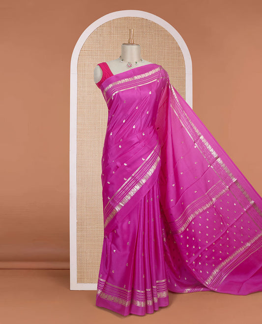 Rani pink paisley buttas Mysore silk saree, traditional zari border of peacock designs, and pallu steeped with paisleys