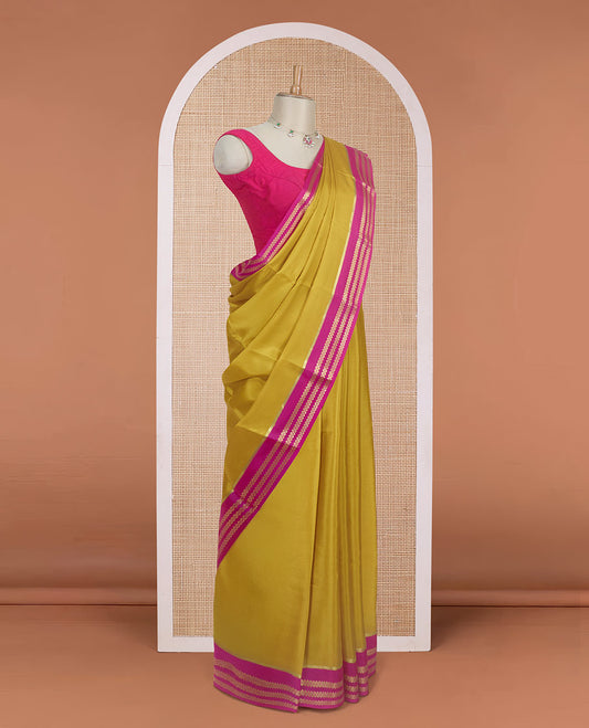Mustard plain design Mysore silk saree with contrast rettai pettu borders of zari designs, and zari striped pallu