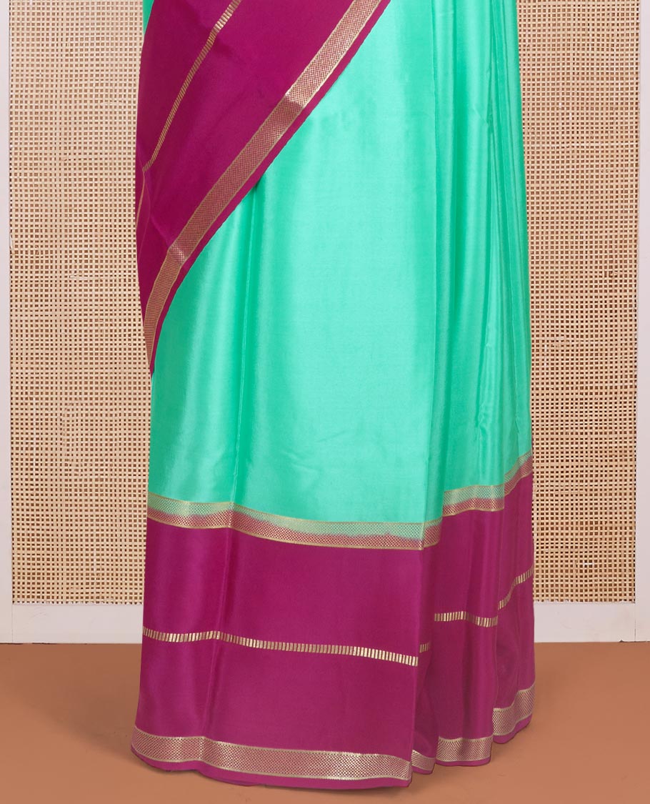 Turquoise plain design Mysore silk saree, contrast rettai pettu borders of zari designs, and pallu of zari stripes & temple design