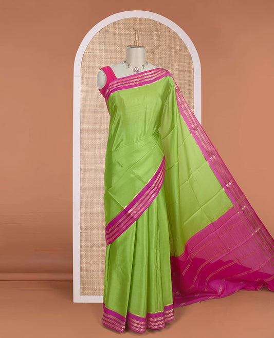 Parrot green plain design Mysore silk saree with contrast rettai pettu borders of zari designs, and zari striped pallu