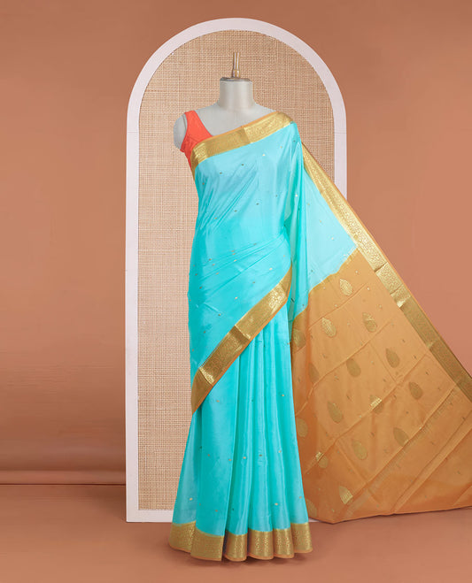 Powder blue zari buttas Mysore silk saree, contrast floral zari border, and zari design palllu