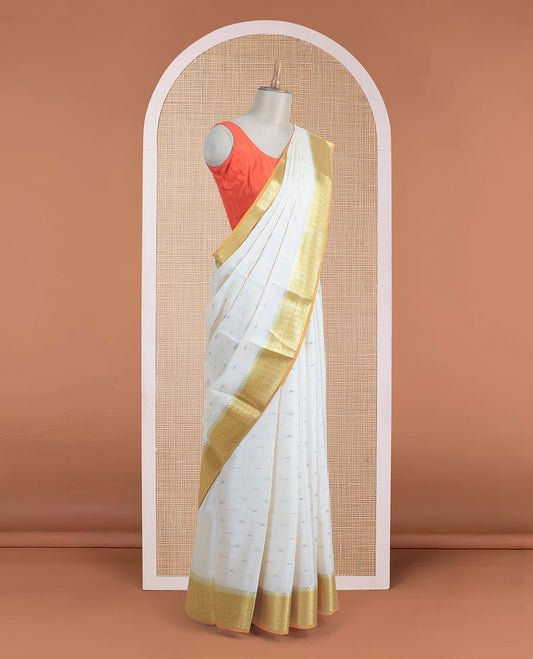 Cream zari buttas Mysore silk saree, contrast floral creeper zari designs, and zari woven pallu