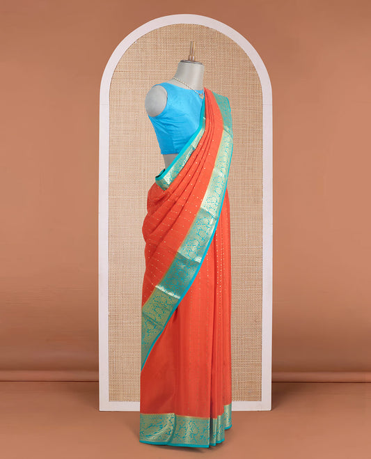 Orange zari buttas Mysore silk saree, contrast traditional zari border, and jaal pallu