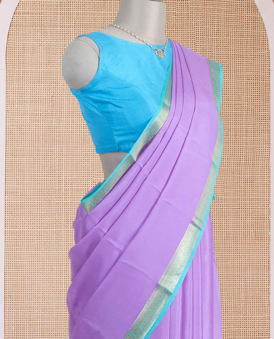 Light lavender plain Mysore silk saree, contrast traditional zari border, and zari striped pallu
