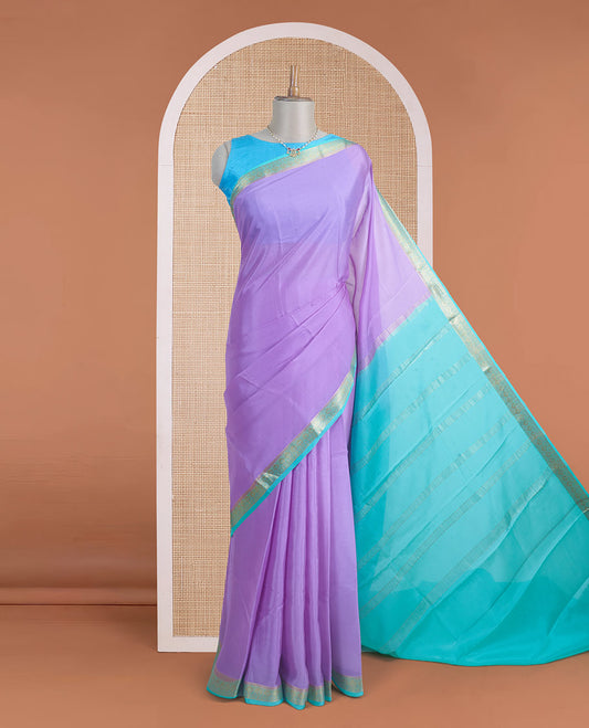 Light lavender plain Mysore silk saree, contrast traditional zari border, and zari striped pallu