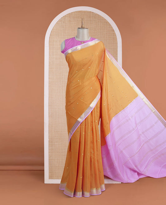 Orange zari buttas steeped Mysore silk saree, contrast traditional zari border, and pallu of zari stripes