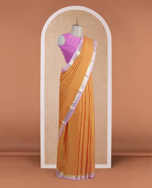 Orange zari buttas steeped Mysore silk saree, contrast traditional zari border, and pallu of zari stripes
