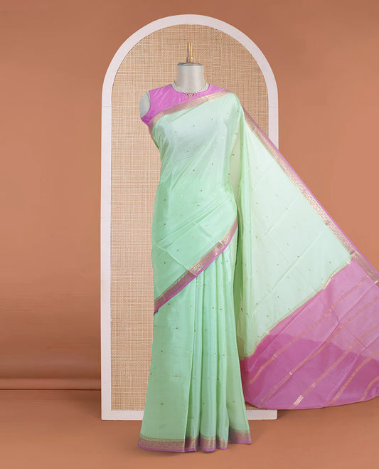 Light pista green zari buttas Mysore silk saree, contrast floral creeper zari border, and zari striped pallu
