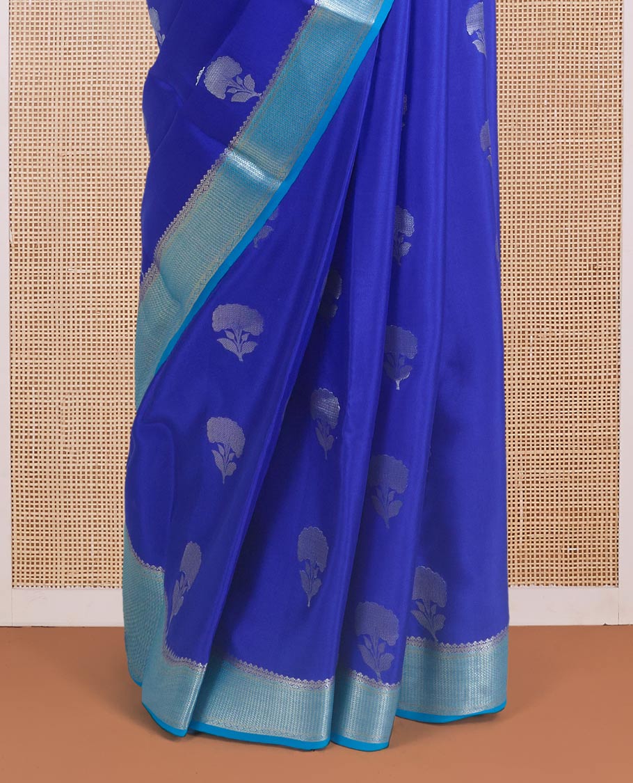 Blue floral zari buttas steeped Mysore silk saree, contrast temple zari border, and scallop zari design pallu