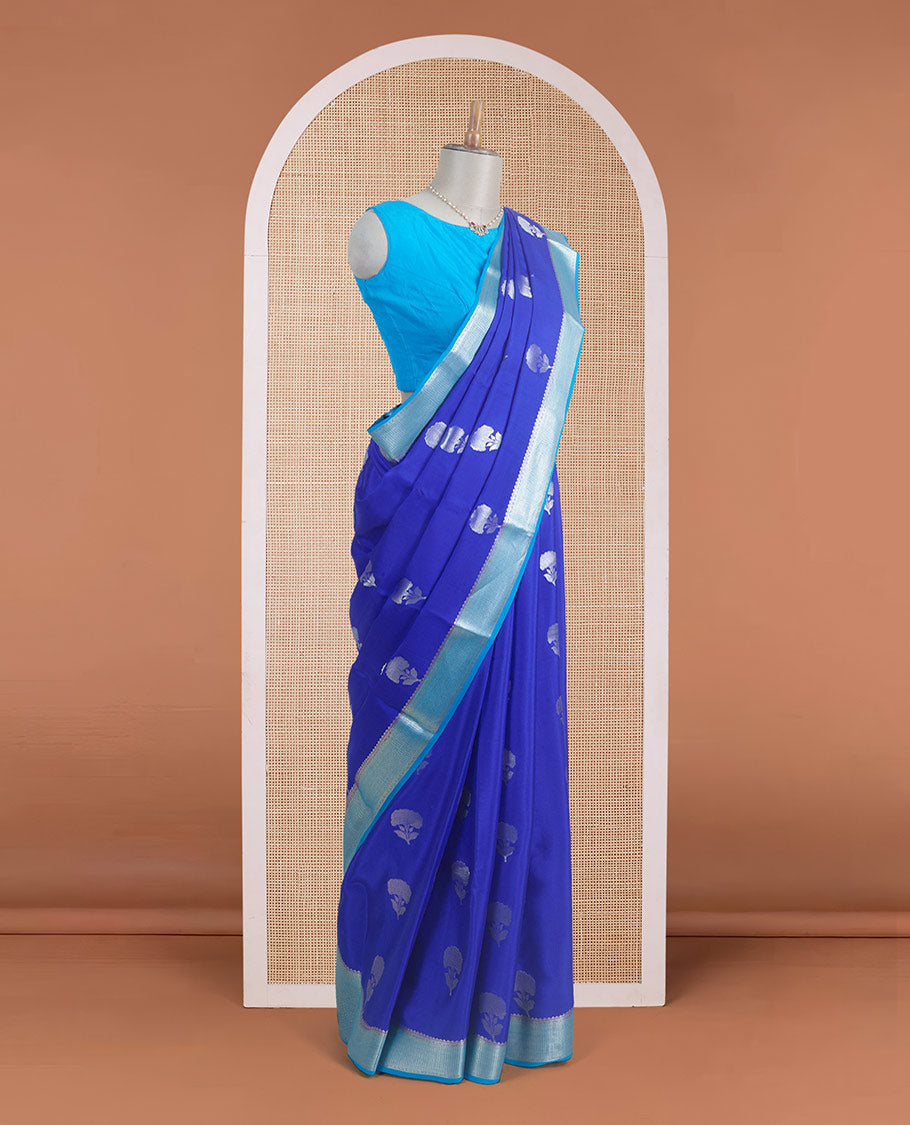 Blue floral zari buttas steeped Mysore silk saree, contrast temple zari border, and scallop zari design pallu