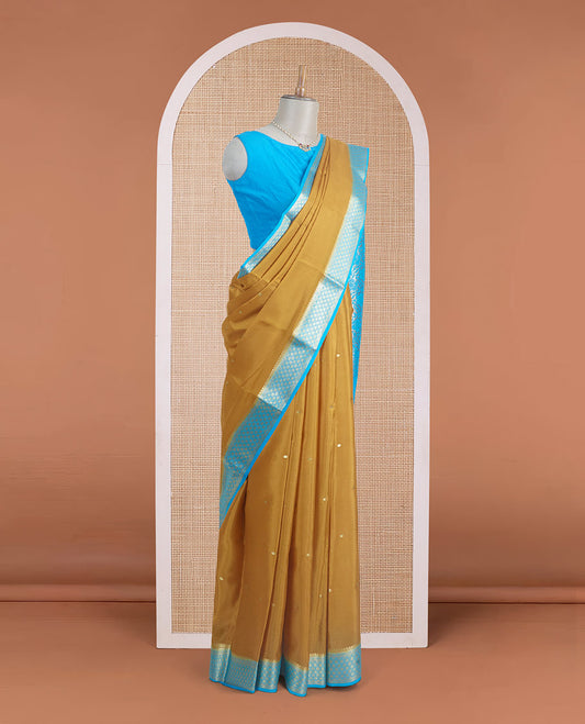 Mustard zari buttas Mysore silk saree, contrast jaal zari border, and floral jaal design zari woven pallu