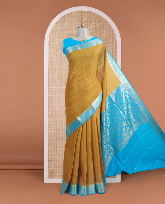 Mustard zari buttas Mysore silk saree, contrast jaal zari border, and floral jaal design zari woven pallu