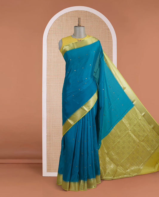 Green zari buttas Mysore silk saree, contrast jaal zari border, and floral jaal design zari woven pallu