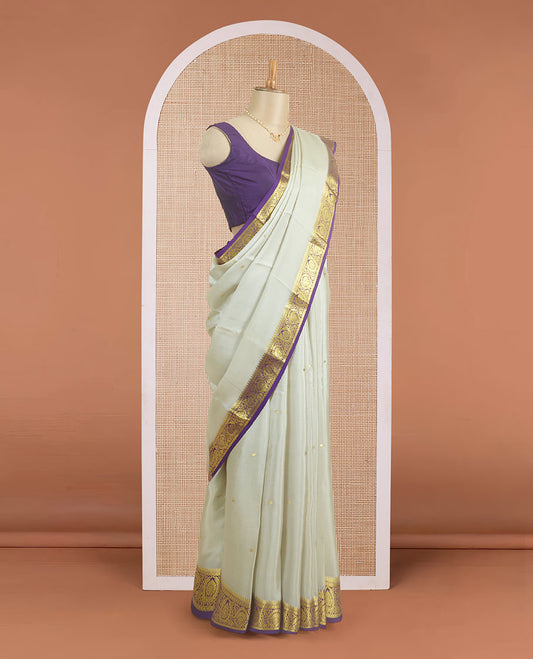 Light sandal zari buttas woven Mysore silk saree, contrast intricate zari border, and jaal patterned pallu